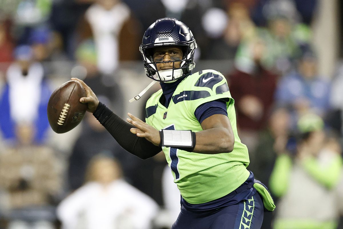 Geno Smith #7 of the Seattle Seahawks passes during the first quarter against the San Francisco 49ers at Lumen Field on December 15, 2022 in Seattle, Washington.