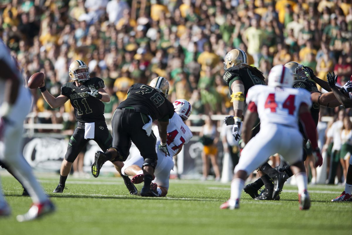 WACO, TX - SEPTEMBER 2: Nick Florence #11 of Baylor University Bears throws a pass against SMU Mustangs on September 2, 2012 at Floyd Casey Stadium in Waco, Texas.  (Photo by Cooper Neill/Getty Images)