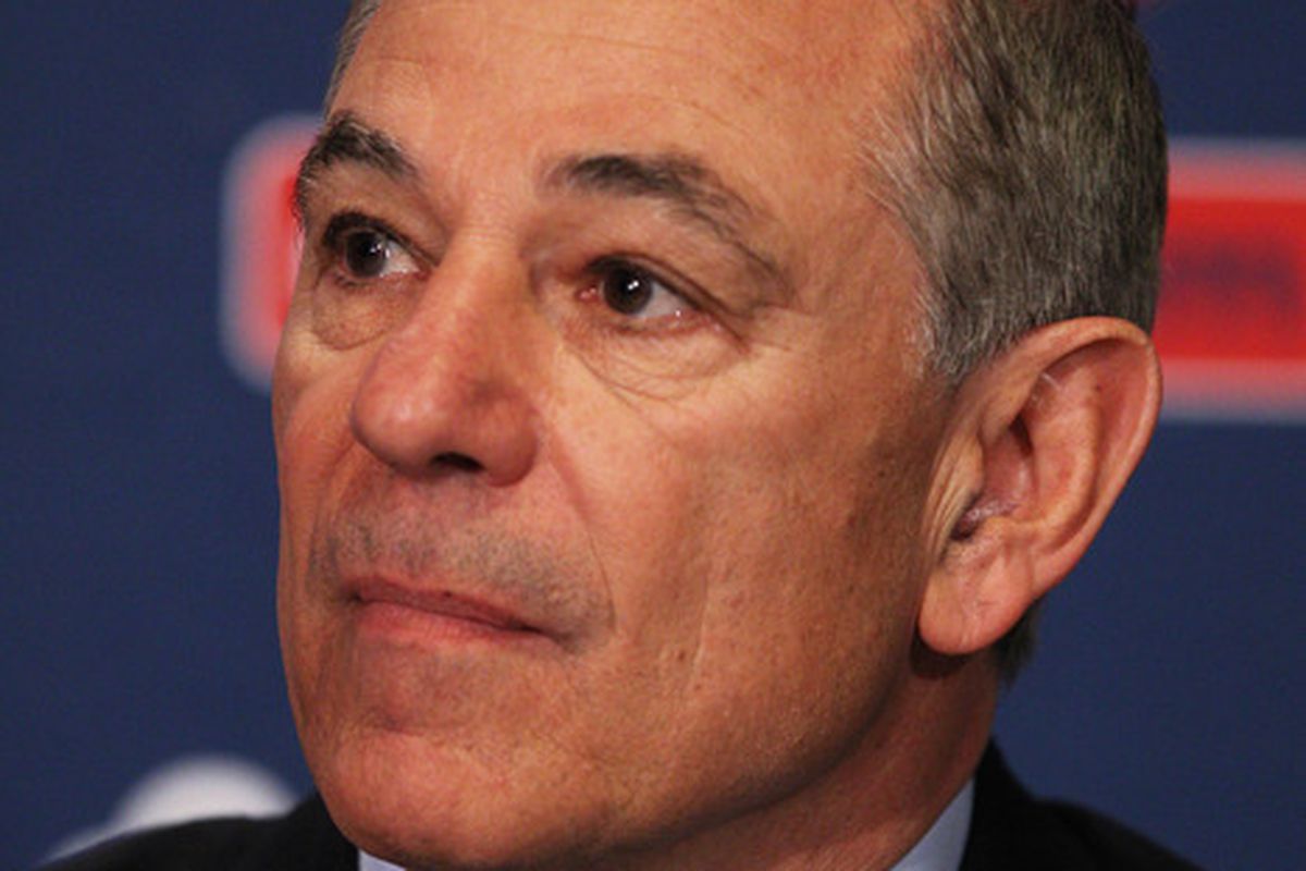 Bobby Valentine hides below the frame during a press conference introducing him as the new manager of the Boston Red Sox at Fenway Park on December 1, 2011 in Boston, Massachusetts.  (Photo by Elsa/Getty Images)
