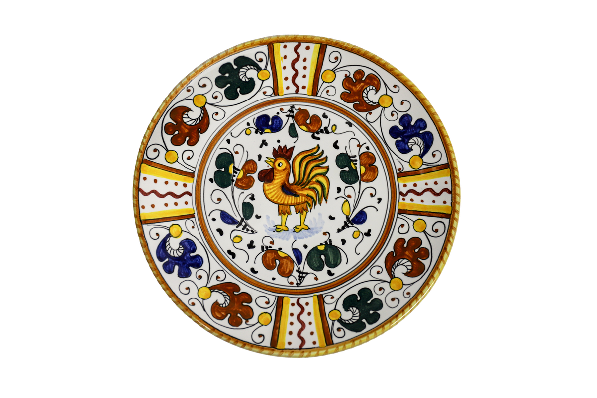A colourfully illustrated antipasti plate, featuring birds and flowers in the Solimene style