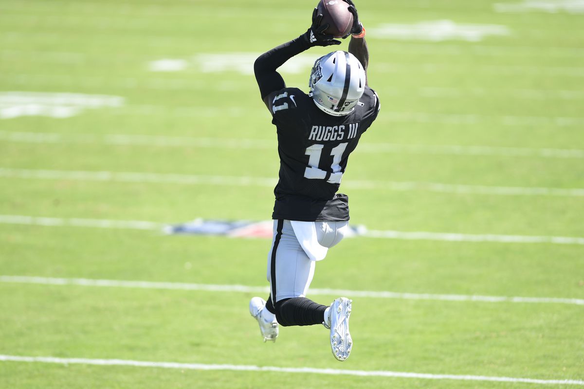 Las Vegas Raiders wide receiver Henry Ruggs III (11) tries to make a catch in the second quarter at Bank of America Stadium.