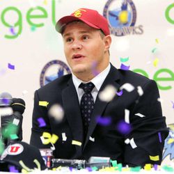 Salem Hills' Porter Gustin announces Tuesday, Feb. 3, 2015, that he will be playing for the USC Trojans, during an event at the School with family friends and coaches around.

<img height="1" width="1" src="http://beacon.deseretconnect.com/beacon.gif?cid=250148&pid=7&reqid=142500&campid=" />