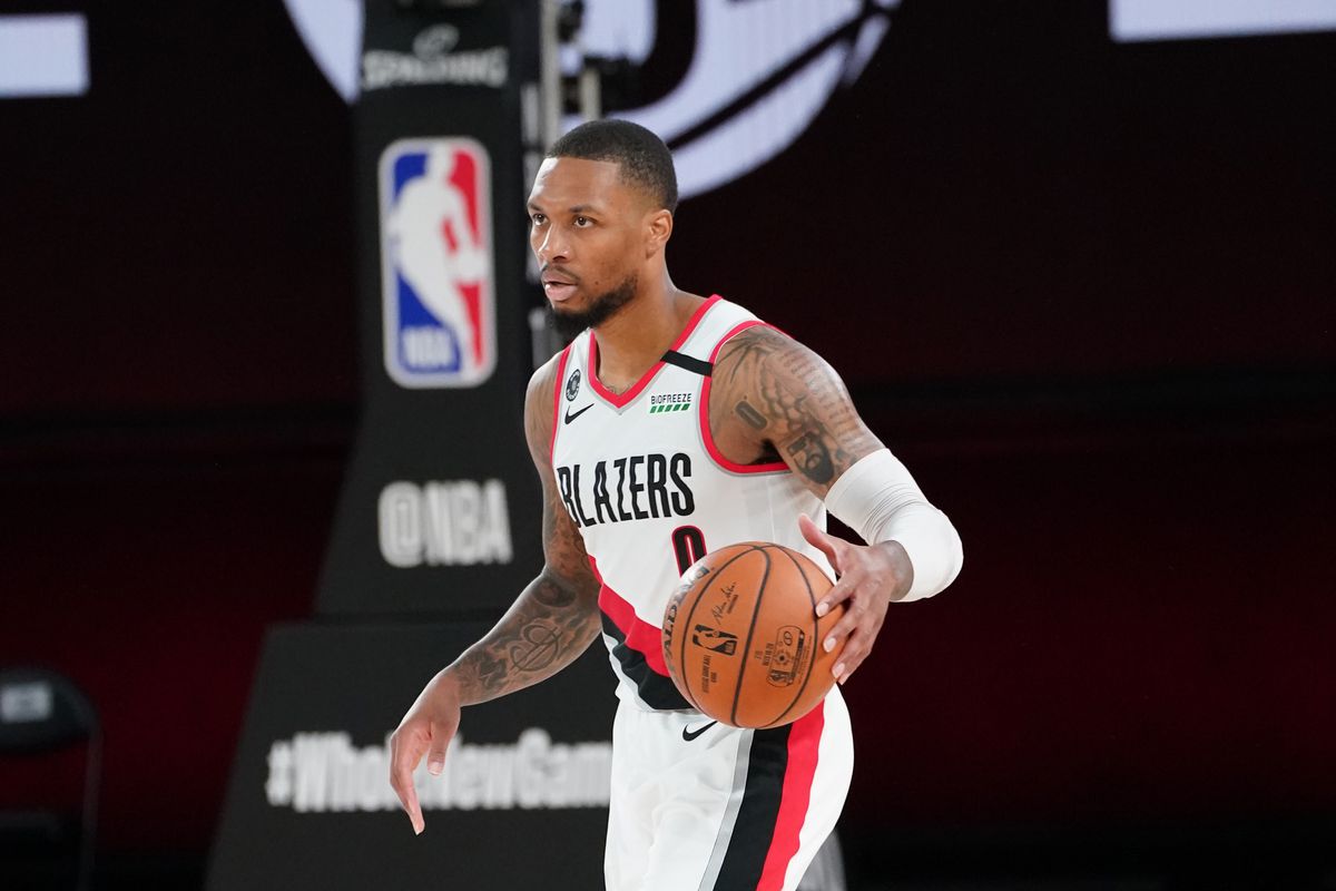 Damian Lillard of the Portland Trail Blazers handles the ball against the Brooklyn Nets on August 13, 2020 at the AdventHealth Arena at in Orlando, Florida.