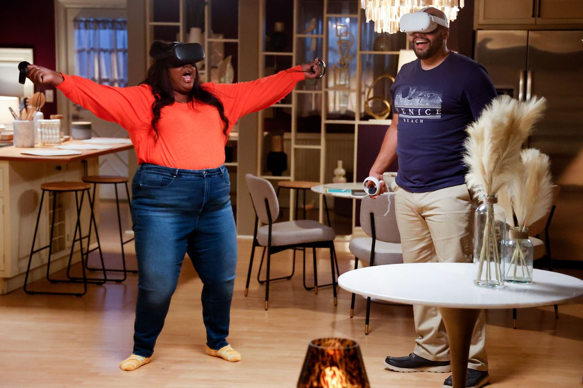 Nicole Byer and Justin Cunningham play with virtual reality consoles in Grand Crew.