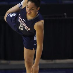 UConn's Gabby Williams stretches before practice.