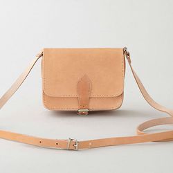 A teensy style with an equally tiny price. Steven Alan <a href="http://www.stevenalan.com/SMALL-LEATHER-SATCHEL/87363,default,pd.html#cgid=womens-shoes-and-accessories-bags-slgs&view=all&frmt=ajax&start=0&hitcount=118">small leather satchel</a>, $60.