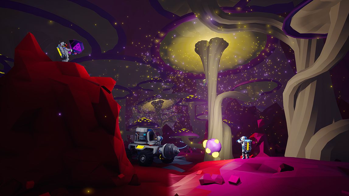 A screenshot from Astroneer, where two astronauts stand inside a pink cavern