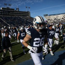 Brigham Young University players exit the field after warmups before a game against the UMass Minutemen at LaVell Edwards Stadium in Provo on Saturday, Nov. 19, 2016.