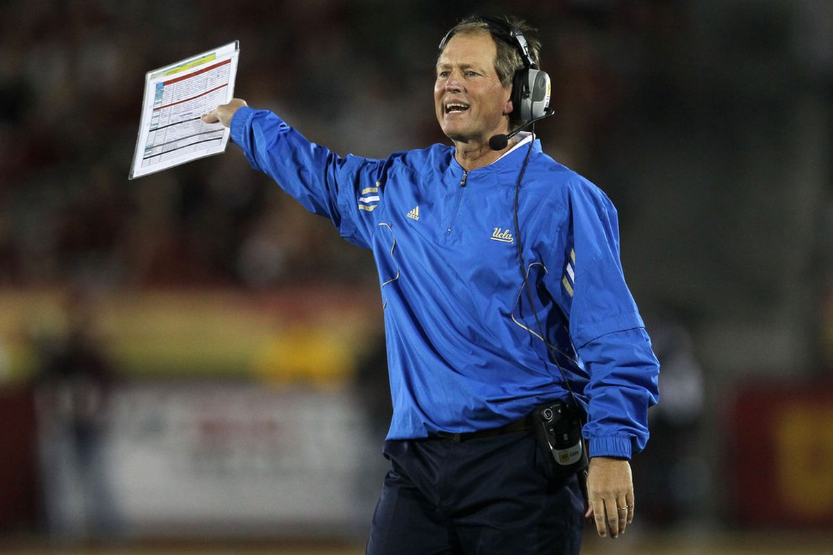 LOS ANGELES, CA - NOVEMBER 26:  Head coach Rick Neuheisel wonders if anyone will want to see his resume as a coach ever agajn.  (Photo by Stephen Dunn/Getty Images)