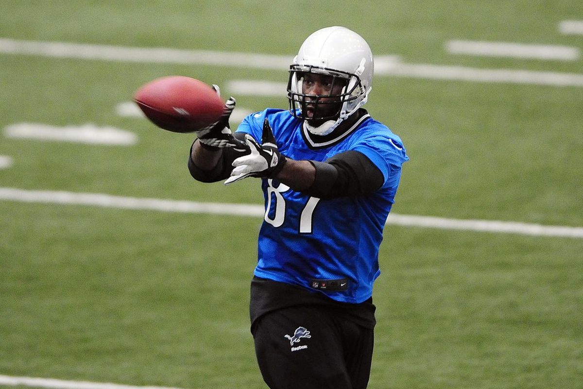 May 29, 2012; Allen Park, MI, USA; Detroit Lions tight end Brandon Pettigrew (87) catches a pass during organized team activities at Lions training facility. Mandatory Credit: Andrew Weber-US PRESSWIRE