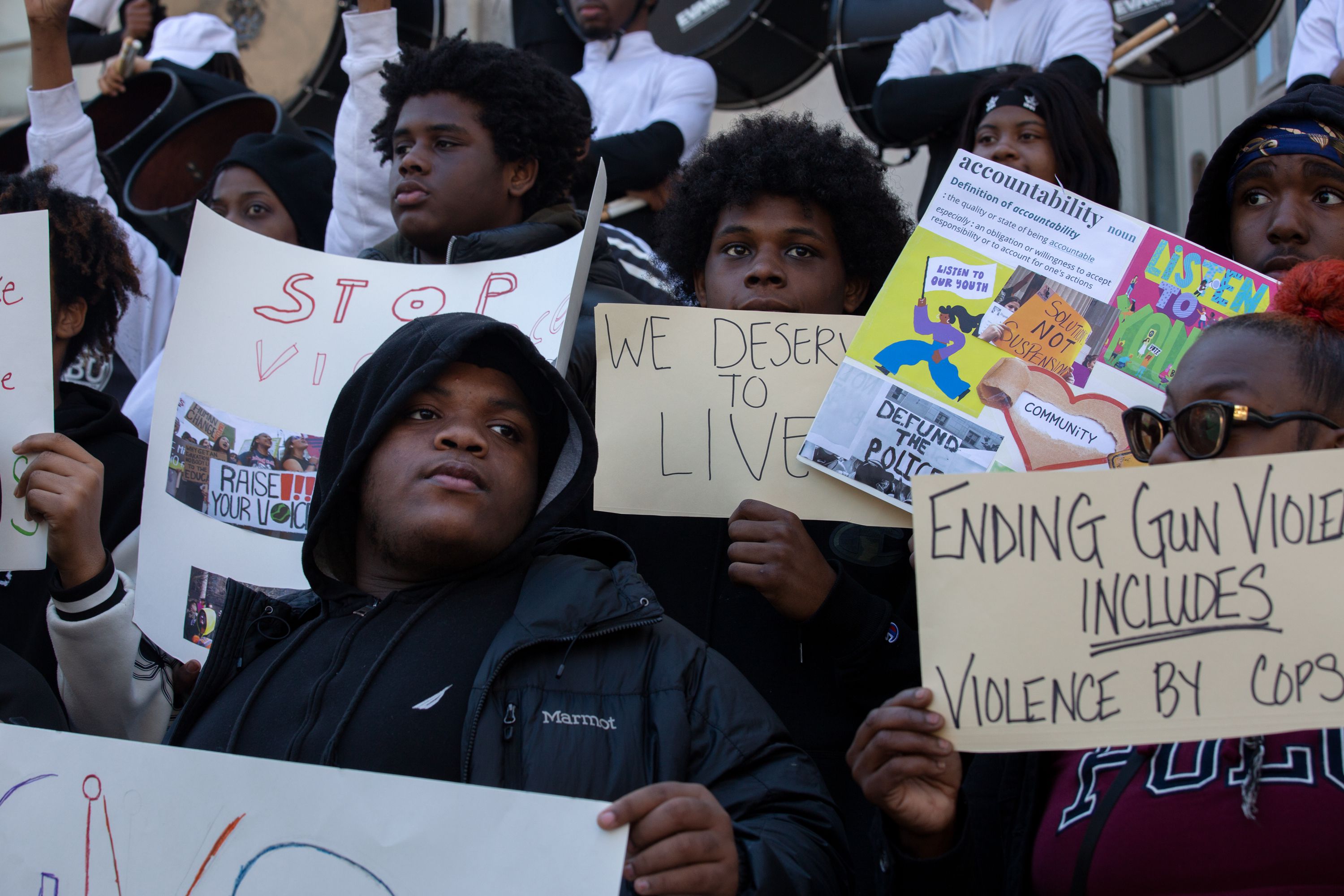 Brownsville teens Kyi-el, Brendan and Kawun rally at Brooklyn Borough with community members, demanding accountability for retired NYPD officer Kruythoff Forrester chasing them with a gun.