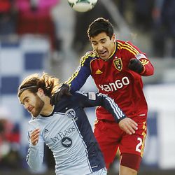 Real's Tony Beltran and Kansas City's Graham Zusi head the ball as Real Salt Lake and Sporting KC play Saturday, Dec. 7, 2013 in MLS Cup action.