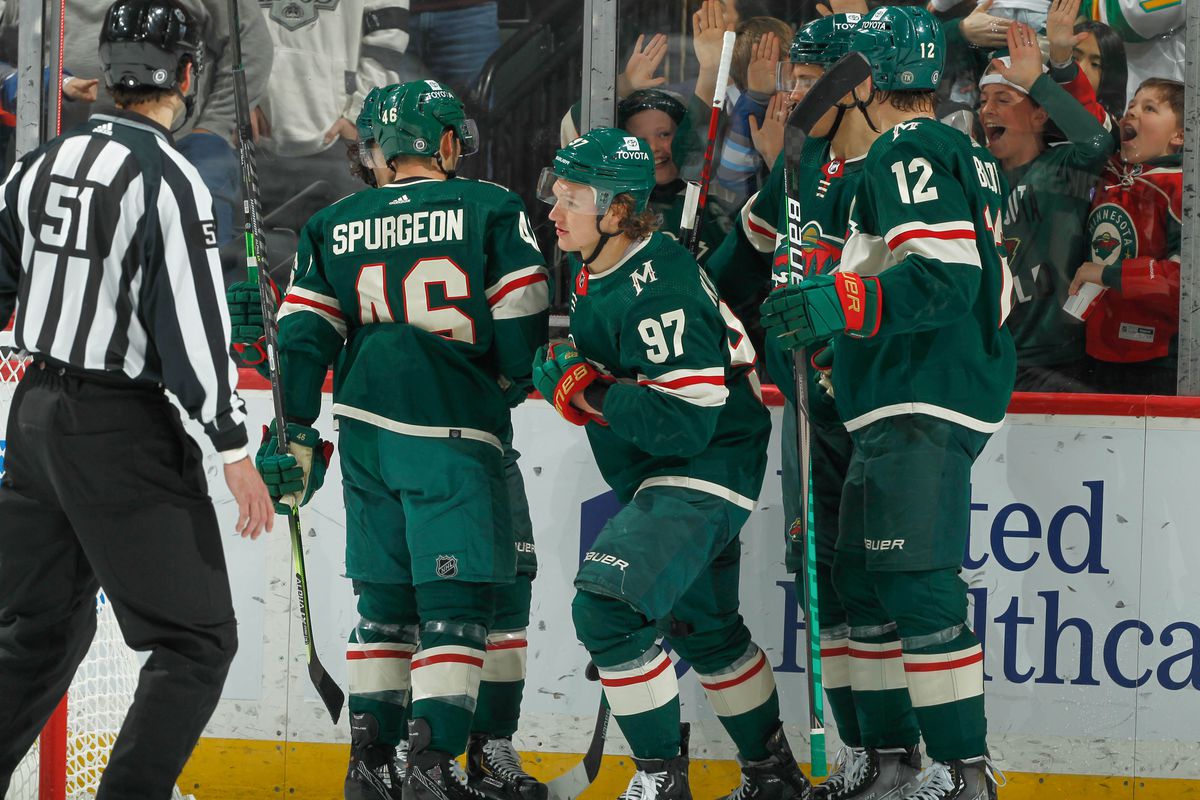Kirill Kaprizov #97 celebrates a goal with his teammates Jared Spurgeon #46 and Matt Boldy #12 of the Minnesota Wild against the Los Angeles Kings during the game at the Xcel Energy Center on April 10, 2022 in Saint Paul, Minnesota.