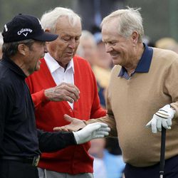 From left, honorary starters Gary Player, Arnold Palmer and Jack Nicklaus chat after hitting on the first tee during the first round of the Masters golf tournament Thursday, April 11, 2013, in Augusta, Ga. 