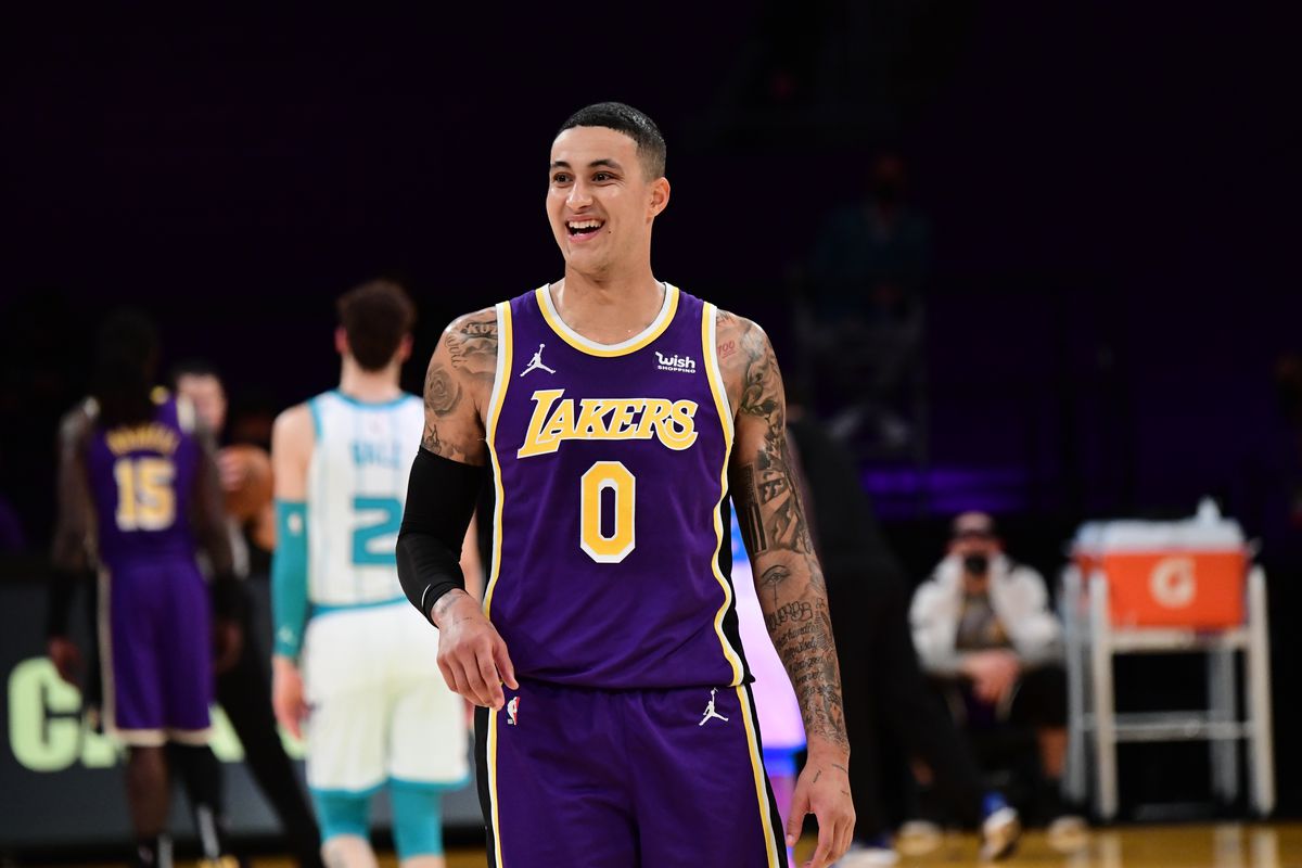 Kyle Kuzma of the Los Angeles Lakers smiles during the game against the Charlotte Hornets on March 18, 2021 at STAPLES Center in Los Angeles, California.