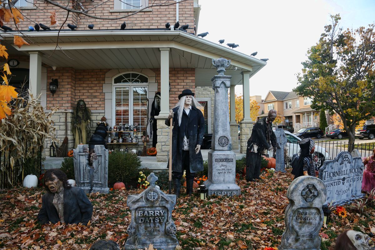 Scary Halloween decorations outside the Thornhill Woods Haunted House during the COVID-19 pandemic in Thornhill, Ontario, Canada.