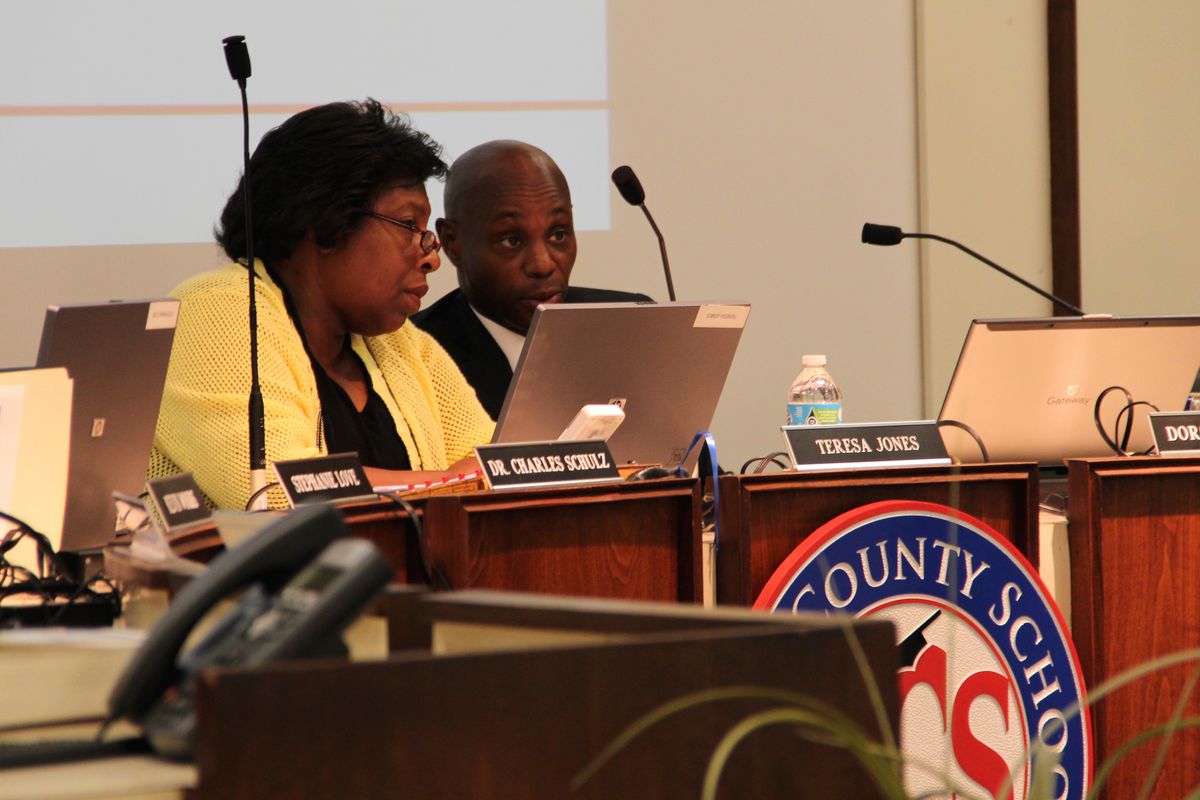 Former Shelby County Board of Education Chairwoman Teresa Jones confers with then Superintendent Dorsey Hopson during a 2015 school board meeting. Jones' seat is now up for an interim appointment.