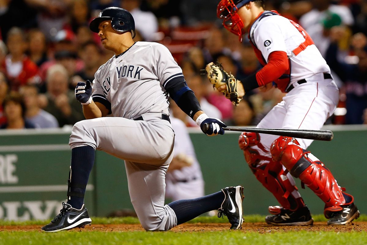 BOSTON, MA - Alex Rodriguez #13 of the New York Yankees strikes out against the Boston Red Sox during the game on September 11, 2012 at Fenway Park in Boston, Massachusetts.  (Photo by Jared Wickerham/Getty Images)