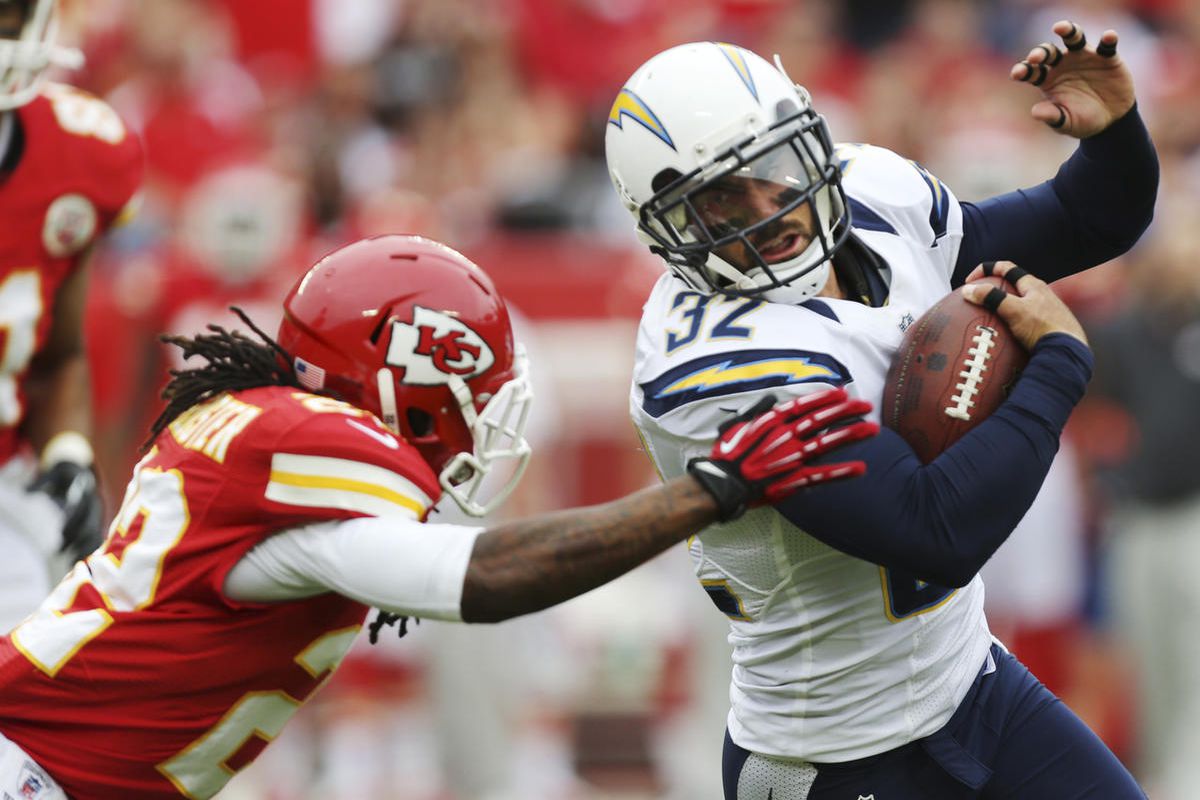 Free safety Eric Weddle (32) gets past Kansas City Chiefs wide receiver Dexter McCluster (22) after an interception during the first half of an NFL football game at Arrowhead Stadium in Kansas City, Mo., Sunday, Sept. 30, 2012. (AP Photo/Ed Zurga)