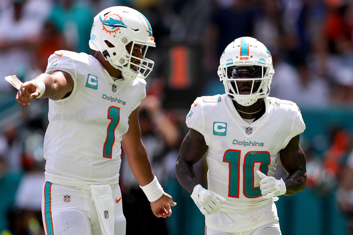 &nbsp;Tua Tagovailoa and Tyreek Hill of the Miami Dolphins in action during the first half of the game against the Buffalo Bills at Hard Rock Stadium on September 25, 2022 in Miami Gardens, Florida.