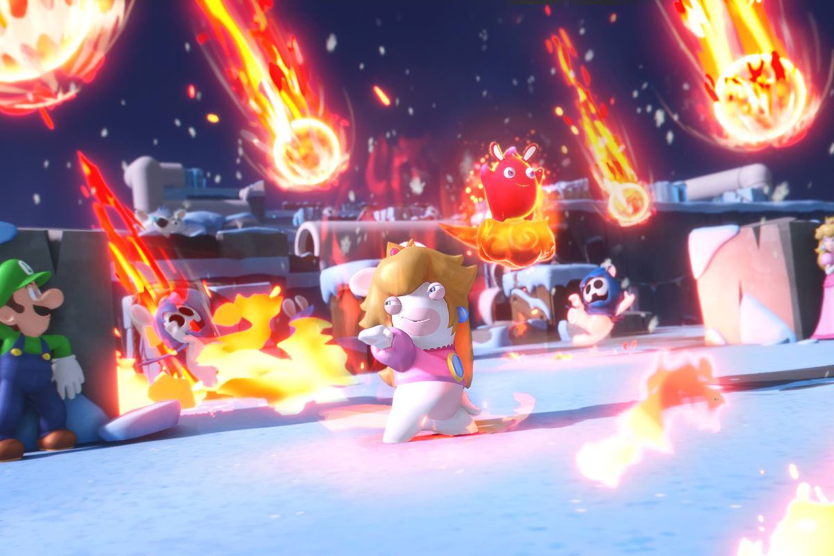 Rabbid Peach stands in front of Luigi as fireballs rain from the sky in Mario + Rabbids Sparks of Hope.