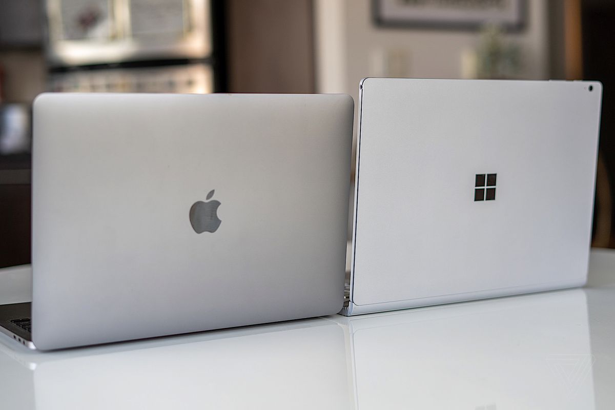 A MacBook Pro and a Surface Book 3