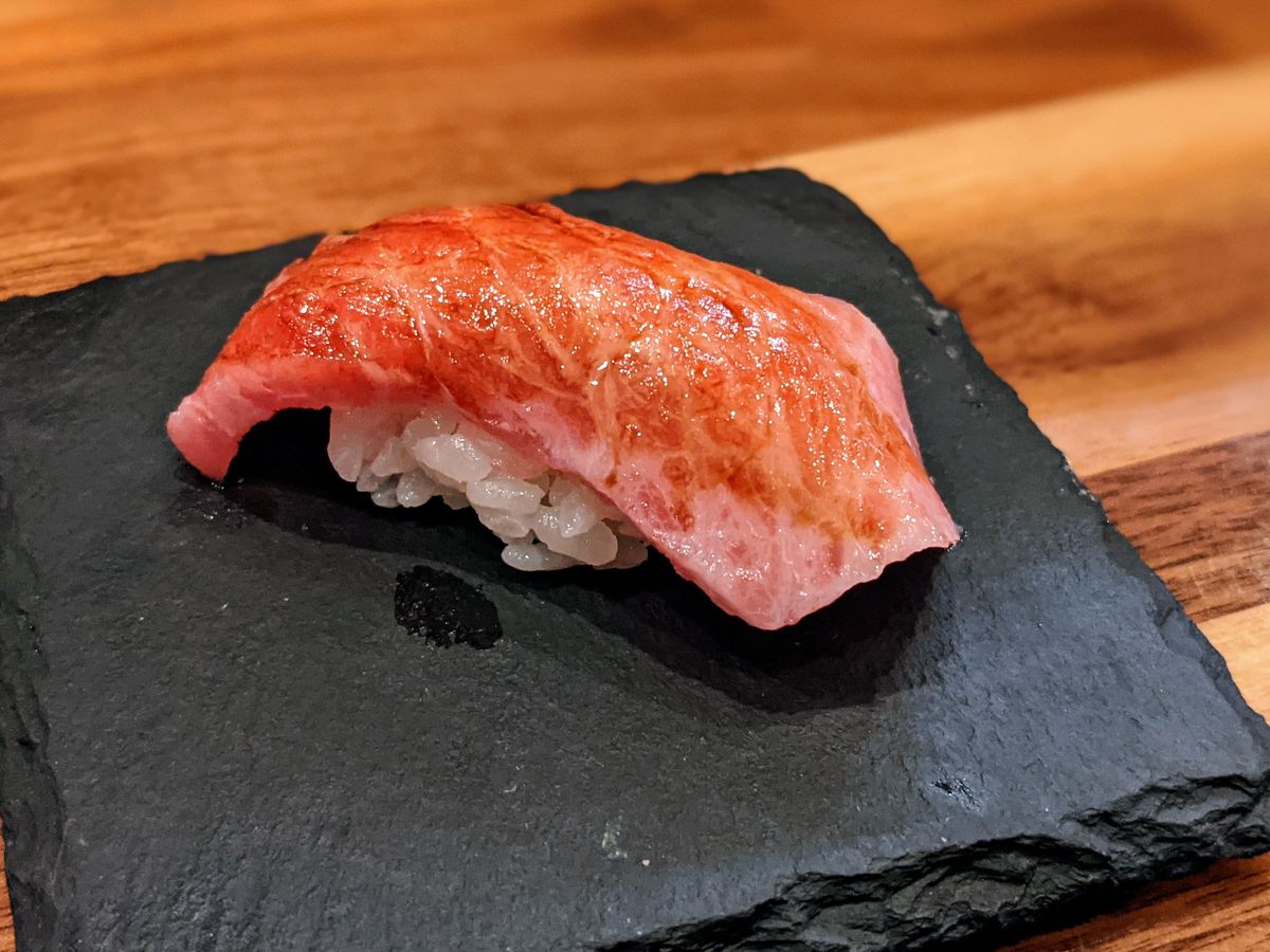 Otoro nigiri by chef Mark Okuda at Brothers Sushi in Woodland Hills, served on a slate.
