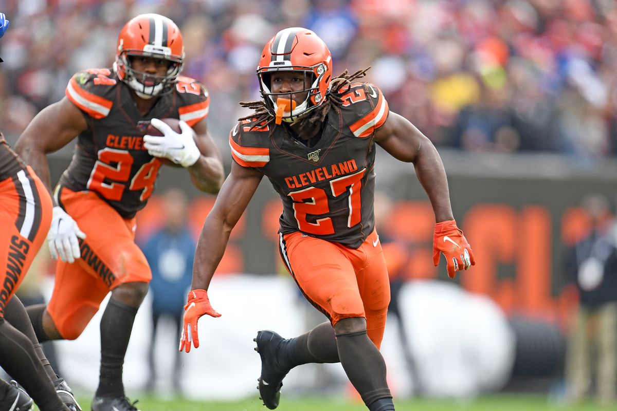 Running back Kareem Hunt blocks for running back Nick Chubb of the Cleveland Browns during the first half against the Buffalo Bills at FirstEnergy Stadium on November 10, 2019 in Cleveland, Ohio.