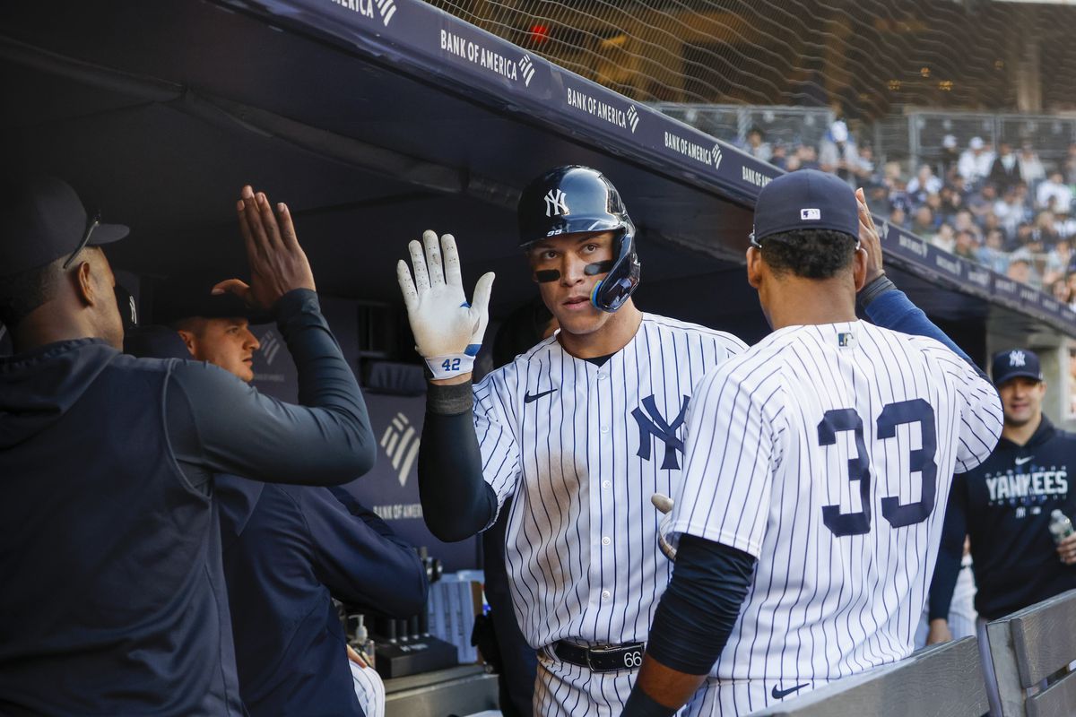 Aaron Judge of the New York Yankees celebrates with teammates during a game against the Los Angeles Angels at Yankee Stadium on April 20, 2023, in New York, New York.