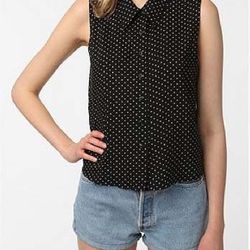 <a href="http://www.urbanoutfitters.com/urban/catalog/productdetail.jsp?id=24352262"><b>Urban Outfitters</b> Reformed By The Reformation Emmy Top</a>, $29.99 (was $54)