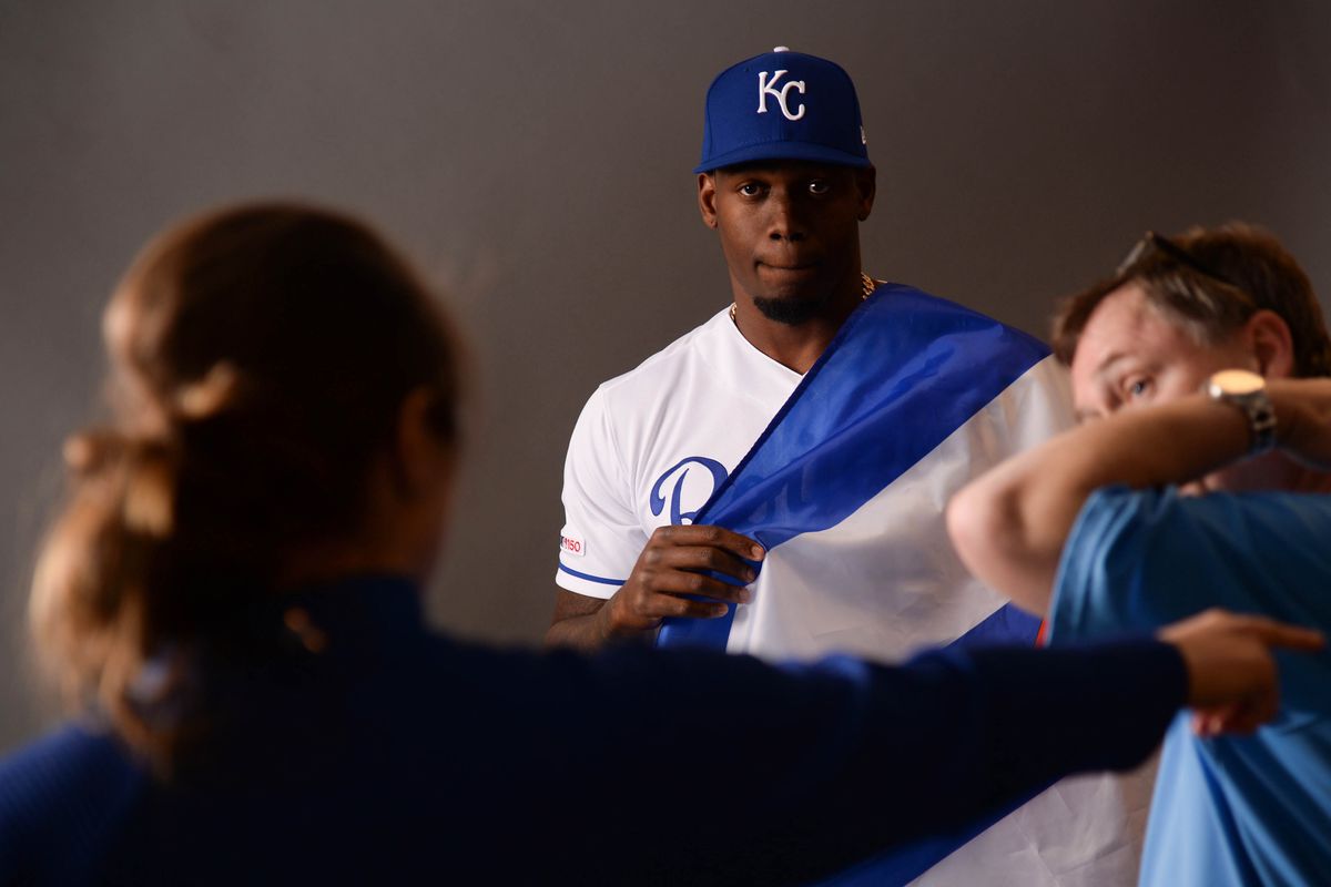 Kansas City Royals right fielder Jorge Soler poses for a photo with the Cuban flag during media day at Surprise Stadium. Mandatory Credit: Joe Camporeale