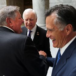 Kem C. Gardner, left, Sen. Orrin Hatch, R-Utah, and Mitt Romney say goodbye at the Capitol in Salt Lake City on Wednesday, Sept. 2, 2015, following the official launch of the Kem C. Gardner Policy Institute.