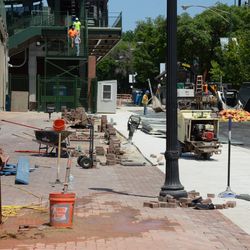 12:08 p.m. The last pavement bricks waiting to go in, along the Sheffield sidewalk - 