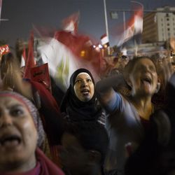 Egyptian women chant slogans against President Mohammed Morsi during a demonstration in in Tahrir Square in Cairo, Thursday, June 27, 2013. Cairo is bracing for mass protests against the government planned for Sunday. (AP Photo/  Manu Brabo)