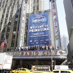 BYU's Ziggy Ansah poses for a photo on top of the marquee with other potential draftees at Radio City Music Hall prior to the 2013 NFL draft.
