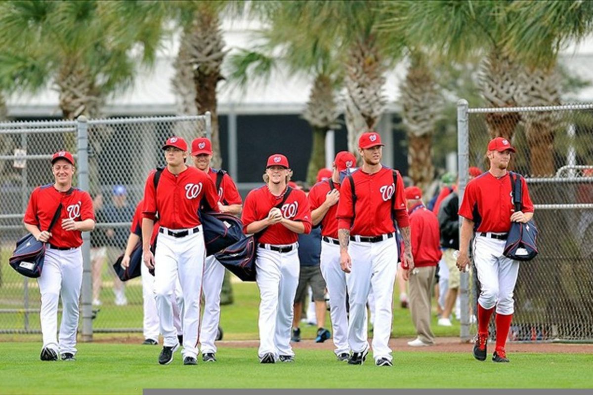 February 23, 2012; Melbourne, FL, USA;  Washington Nationals starting pitcher Stephen Strasburg (37) far right and a host of fellow pitchers head out to begin workouts at Space Coast Stadium. Mandatory Credit: Brad Barr-US PRESSWIRE