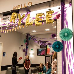 Rylee Bess, 14, second from left, arrives at the fitting rooms to try on different wardrobe options at the Macy's at City Creek Center in Salt Lake City on Friday, Dec. 9, 2016. Rylee, of Perry, has been diagnosed with cystic fibrosis and was granted a makeover by Macy's and Make-A-Wish Utah as part of the retailer's National Believe Day.