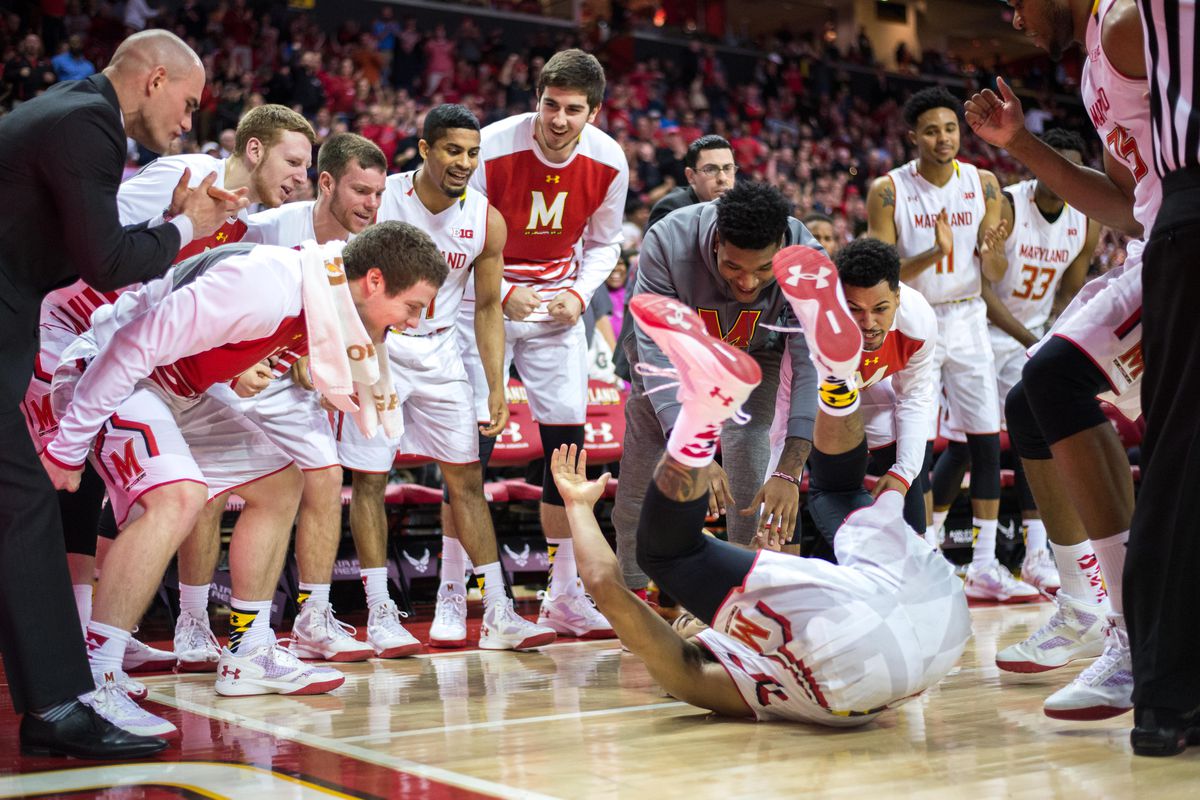 Maryland's bench cheers on Melo Trimble as the point guard draws a foul near the end of the Terps' win over Northwestern on Tuesday.