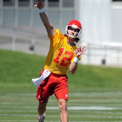 Kansas City Chiefs quarterback Ricky Stanzi (12) throws a pass during organized team activities at the University of Kansas Hospital Training Complex.