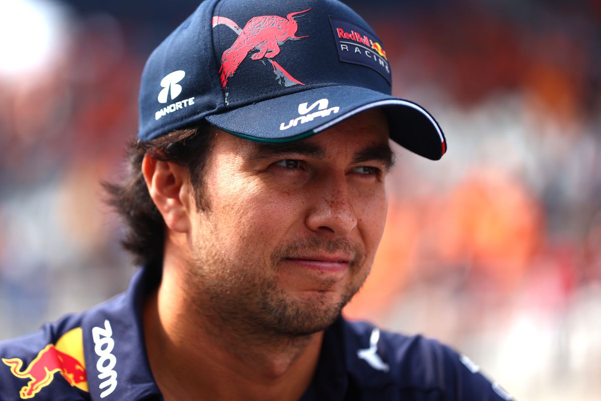 Sergio Perez of Mexico driving the (11) Oracle Red Bull Racing RB18 during the drivers parade during the F1 Grand Prix of The Netherlands at Circuit Zandvoort on September 04, 2022 in Zandvoort, Netherlands.