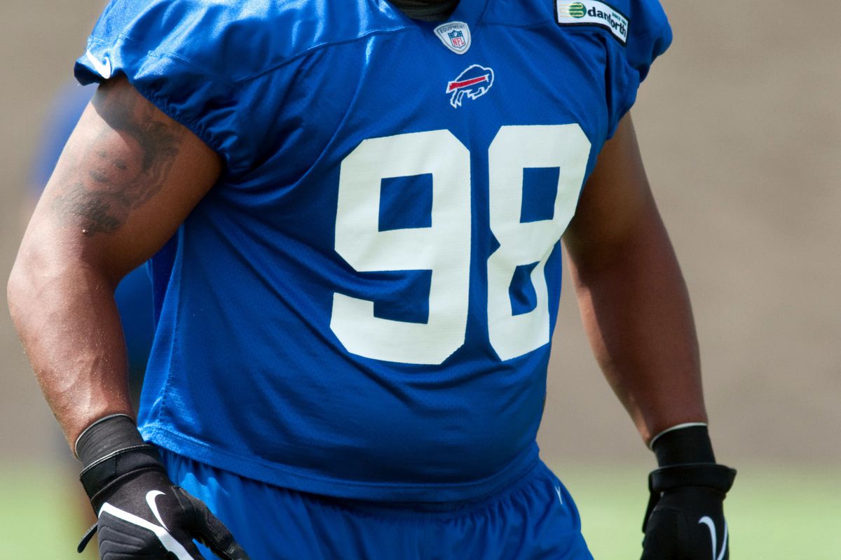 July 27, 2012; Pittsford, NY, USA; Buffalo Bills defensive tackle Dwan Edwards (98) in warm up drills during a training camp practice at St. John Fisher College.   Mandatory Credit: Mark Konezny-US PRESSWIRE