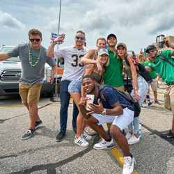SOUTH BEND, IN - SEPTEMBER 01: Notre Dame Fighting Irish fans partake in tailgate party mode prior to game action during the NCAA football game between the Michigan Wolverines and the Notre Dame Fighting Irish on September 1, 2018 at Notre Dame Stadium, in South Bend, Indiana. The Notre Dame Fighting Irish defeated the Michigan Wolverines by the score of 24-17.