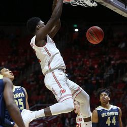 Utah Utes forward Donnie Tillman (3) dunks the ball as Utah and UC Davis play in an NIT basketball game at the Huntsman Center in Salt Lake City on Wednesday, March 14, 2018. Utah won 69-59.