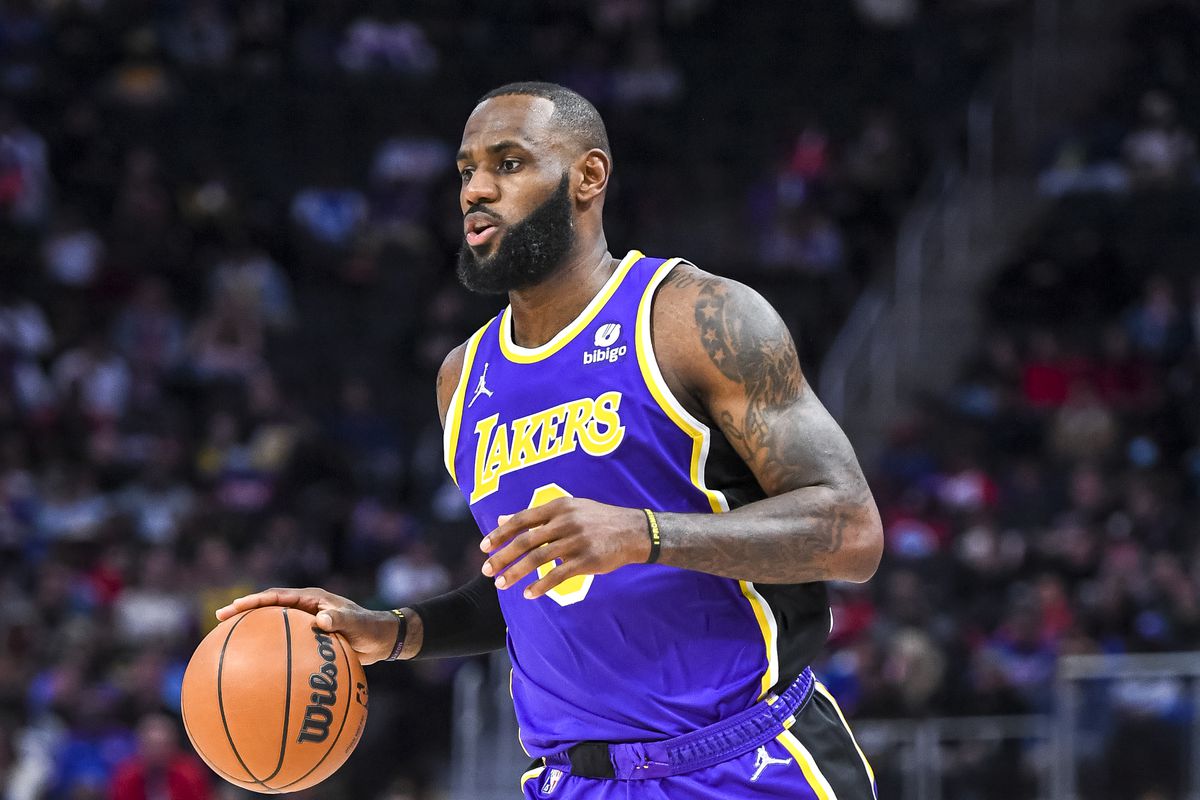 LeBron James #6 of the Los Angeles Lakers handles the ball against the Detroit Pistons during the first quarter of the game at Little Caesars Arena on November 21, 2021 in Detroit, Michigan.
