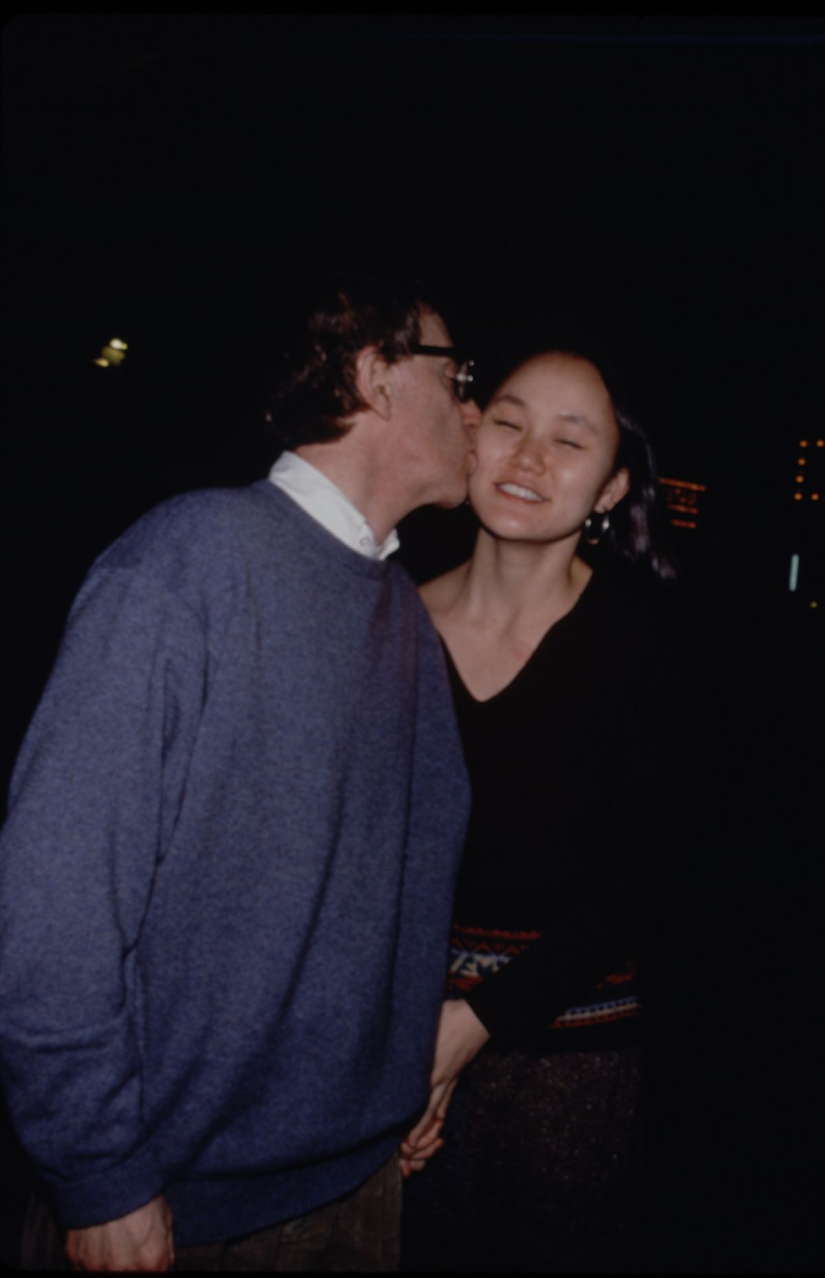 Woody Allen kisses Soon-Yi Previn on the cheek in 1992.