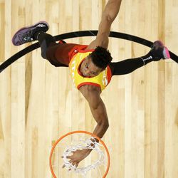 Utah Jazz's Donovan Mitchell competes in the NBA basketball All-Star weekend slam dunk contest Saturday, Feb. 17, 2018, in Los Angeles. Mitchell won the event. (Bob Donnan/Pool via AP)