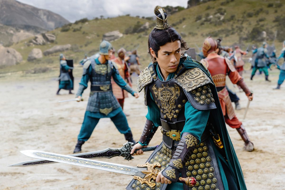 A soldier in period Chinese costume wields two swords in Netflix’s Dynasty Warriors