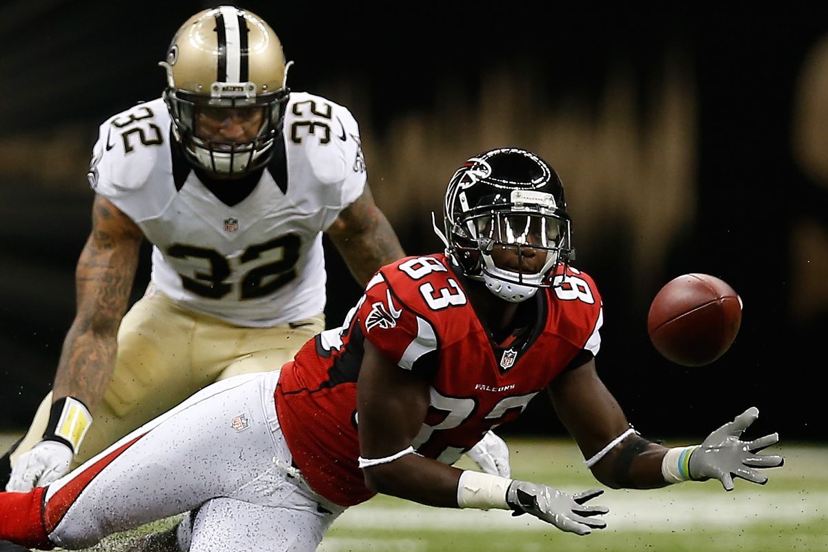 NEW ORLEANS, LA:  New Orleans Saints defensive back Kenny Vaccaro (32) hurries to stop Atlanta Falcons wide receiver Harry Douglas (83) from making a catch during a game at the Mercedes-Benz Superdome.