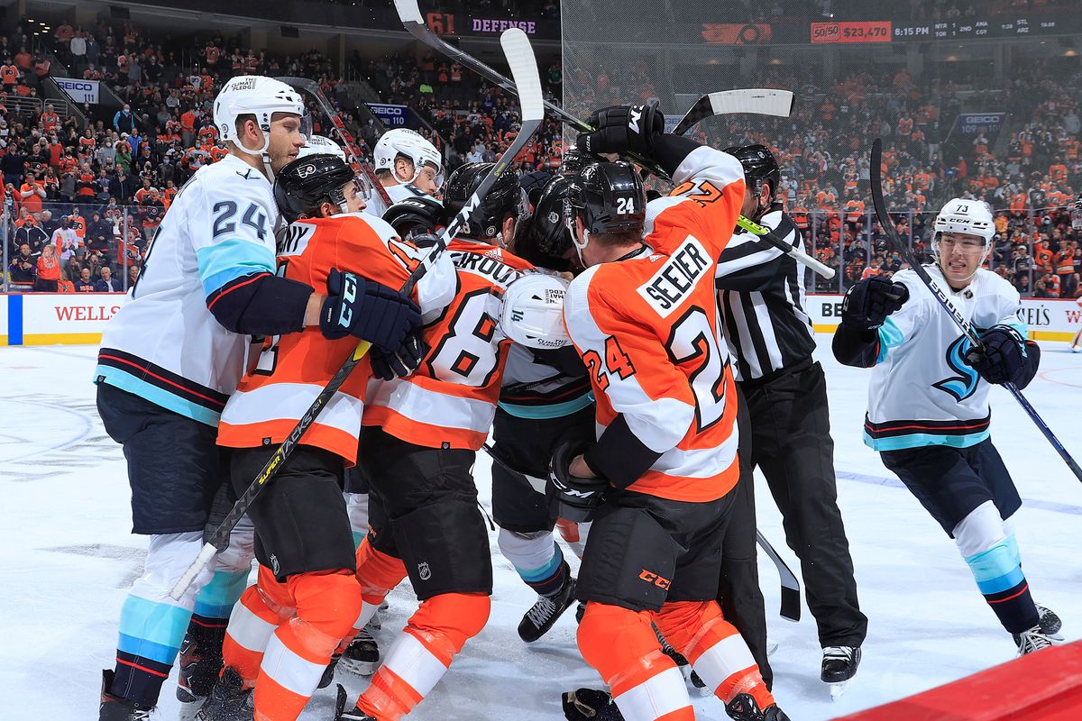 Jamie Oleksiak, Nathan Bastian, and Kole Lind all are in the middle of a scrum involving Travis Konecny, Claude Giroux, and Nick Seeler of the Flyers. It’s a cluster of bodies as they all tussle together.