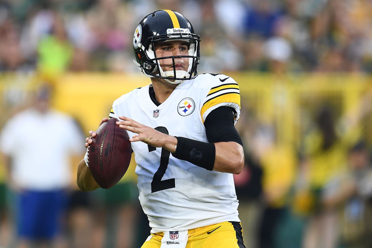 Mason Rudolph #2 of the Pittsburgh Steelers drops back to pass during the first quarter of a preseason game against the Green Bay Packers at Lambeau Field on August 16, 2018 in Green Bay, Wisconsin.